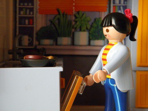 female lego minifigure unloading dishwasher